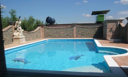 Piscina in cemento Skimmer con mosaico